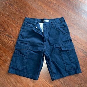 Carhartt Rugged Flex Relaxed Fit Canvas Cargo Work Shorts in Navy Blue.